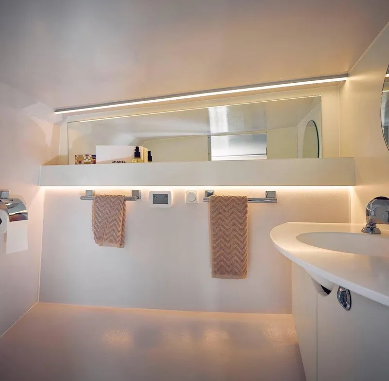 Slide: The Image of Modern bathroom interior of 2020 Frauscher 1017 GT yacht with sleek design and ambient lighting. - 17