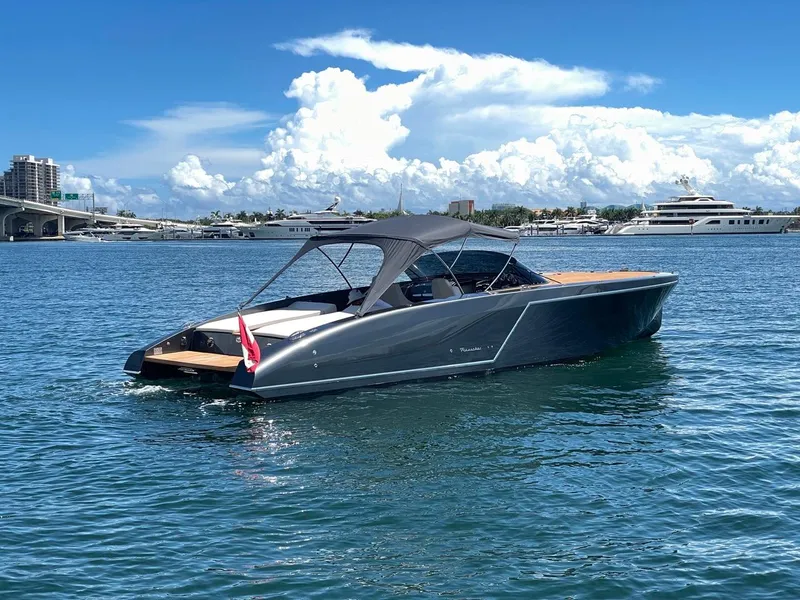 Slide: The Image of 2020 Frauscher 1017 GT luxury motor yacht on calm waters. - 9