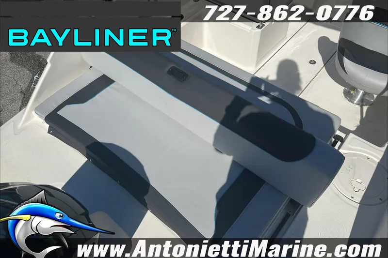 Slide: The Image of 2024 Bayliner Element M19 boat interior with seating and logo, Antonietti Marine branding. - 10
