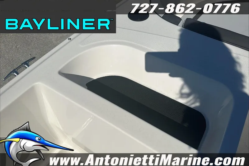 Slide: The Image of 2024 Bayliner Element M19 boat interior with logo and contact details. - 15
