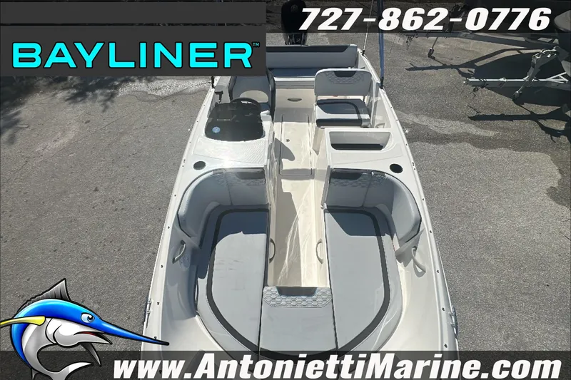 Slide: The Image of 2024 Bayliner Element M19 boat interior with seating and storage, displayed at Antonietti Marine. - 24