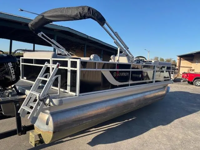 Slide: The Image of 2024 Godfrey 2086EX Xperience Cruise pontoon boat with canopy, parked outdoors. - 6