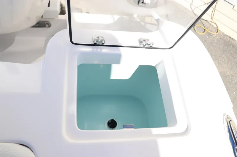 Slide: The Image of 2024 Edgewater 262CX boat livewell with open lid. - 11