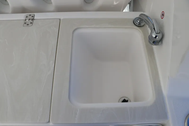 Slide: The Image of 2024 Edgewater 262CX boat sink and faucet. - 27