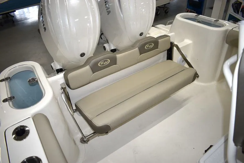 Slide: The Image of 2024 Key West 244 CC boat with rear seating and twin Yamaha engines. - 16