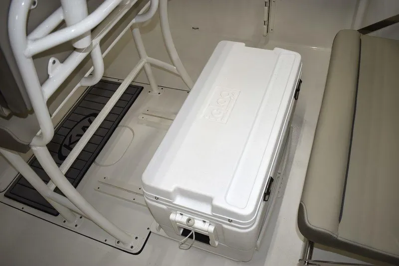 Slide: The Image of White cooler on the deck of a 2024 Key West 244 CC boat. - 18
