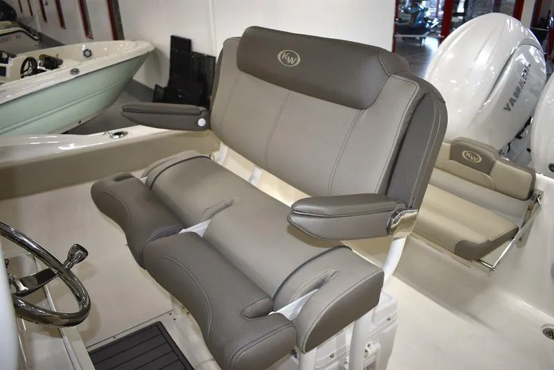 Slide: The Image of 2024 Key West 244 CC boat with comfortable seating and Yamaha outboard motor. - 21