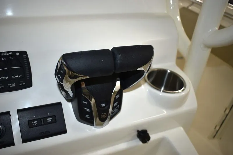 Slide: The Image of 2024 Key West 244 CC boat throttle controls and dashboard. - 31