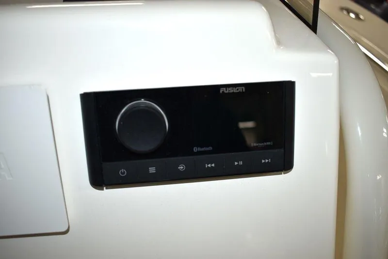 Slide: The Image of 2024 Key West 244 CC boat audio control panel with Bluetooth connectivity. - 34