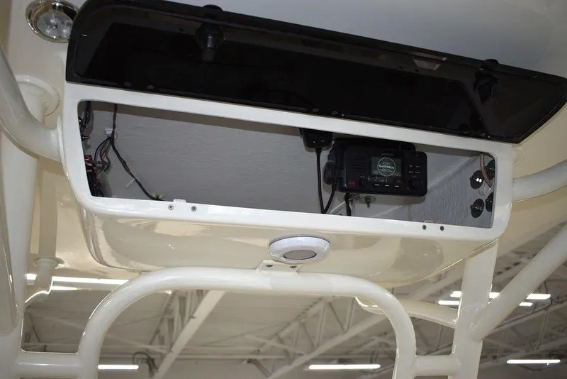Slide: The Image of Open electronics compartment on a 2024 Key West 244 CC boat. - 36