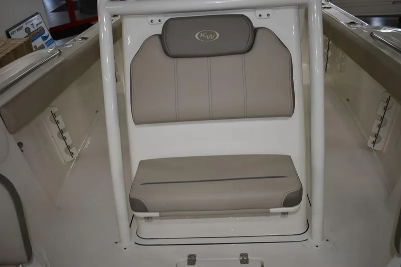 Slide: The Image of 2024 Key West 244 CC boat interior seating area. - 40