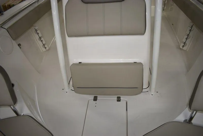 Slide: The Image of 2024 Key West 244 CC boat interior seating and storage compartments. - 41