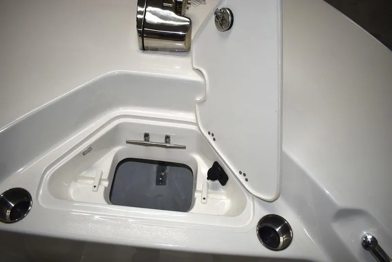 Slide: The Image of 2024 Key West 244 CC boat anchor locker with open hatch. - 44