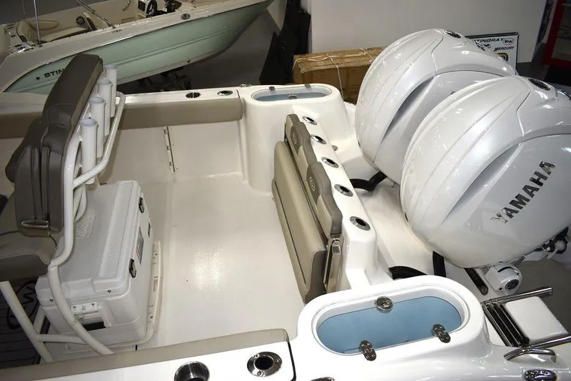 Slide: The Image of 2024 Key West 244 CC boat interior with dual Yamaha engines. - 7