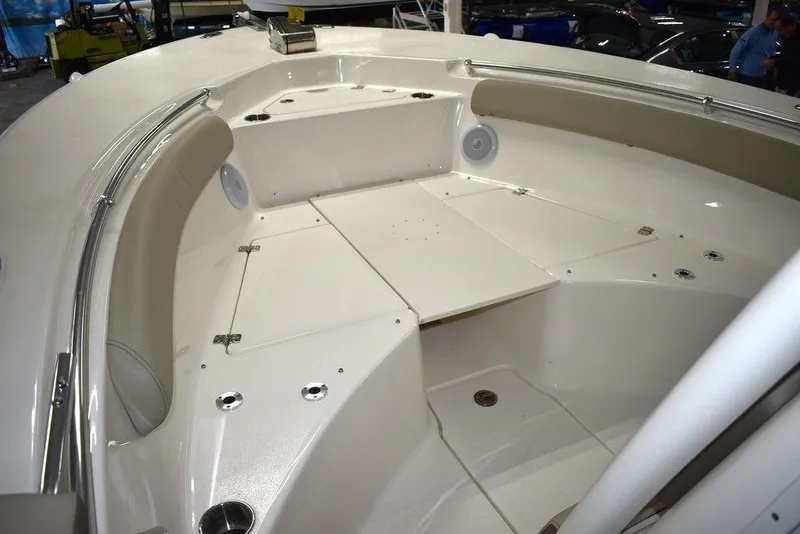 Slide: The Image of 2024 Key West 244 CC boat interior with spacious seating and storage. - 48