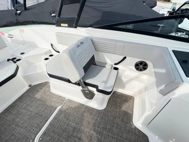 Slide: The Image of 2021 Sea Ray SPO 210 boat interior with seating and modern design. - 7