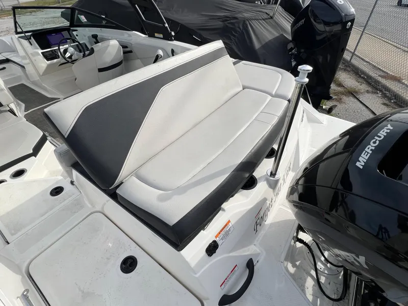 Slide: The Image of 2021 Sea Ray SPO 210 boat with Mercury engine and stylish seating. - 8