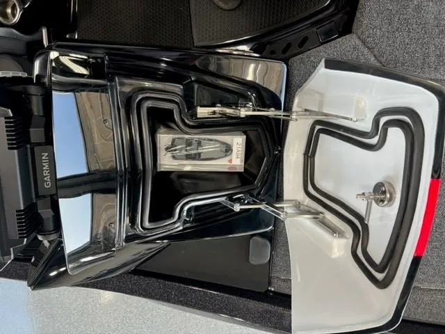 Slide: The Image of iKon LX21 2024 model boat compartment with Garmin electronics. - 17