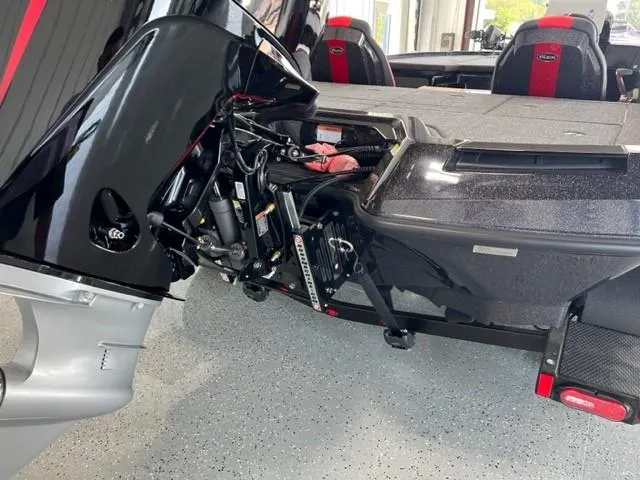 Slide: The Image of 2024 iKon LX21 boat engine and rear deck in showroom. - 7