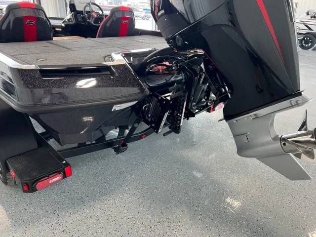 Slide: The Image of 2024 iKon LX21 boat with powerful outboard motor in showroom. - 8