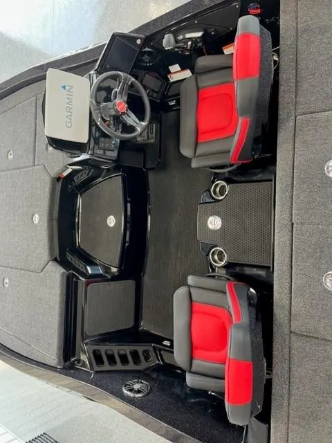 Slide: The Image of 2024 iKon LX21 boat interior with Garmin navigation system and red-black seats. - 9