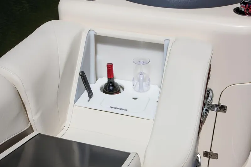 Slide: The Image of 2015 AquaPatio 240 SLR boat with built-in wine holder and glass storage. - 18