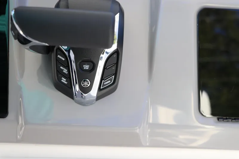 Slide: The Image of Close-up of 2024 Robalo 266 Cayman boat control panel with Yamaha throttle. - 30