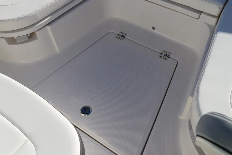Slide: The Image of 2024 Robalo 266 Cayman boat interior storage compartment. - 40