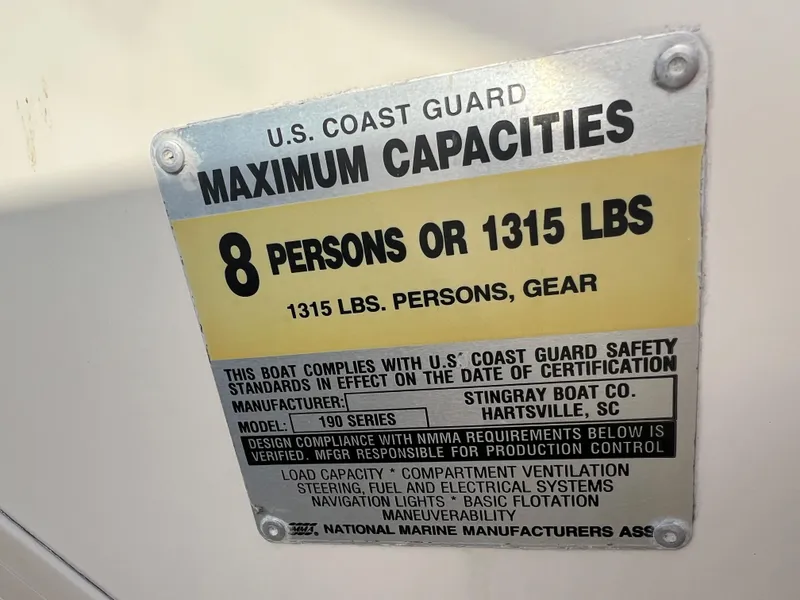 Slide: The Image of U.S. Coast Guard maximum capacities label for 2002 Stingray 180 LS/LX boat. - 13