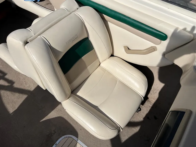Slide: The Image of 2002 Stingray 180 LS/LX boat seat with white and green upholstery. - 18