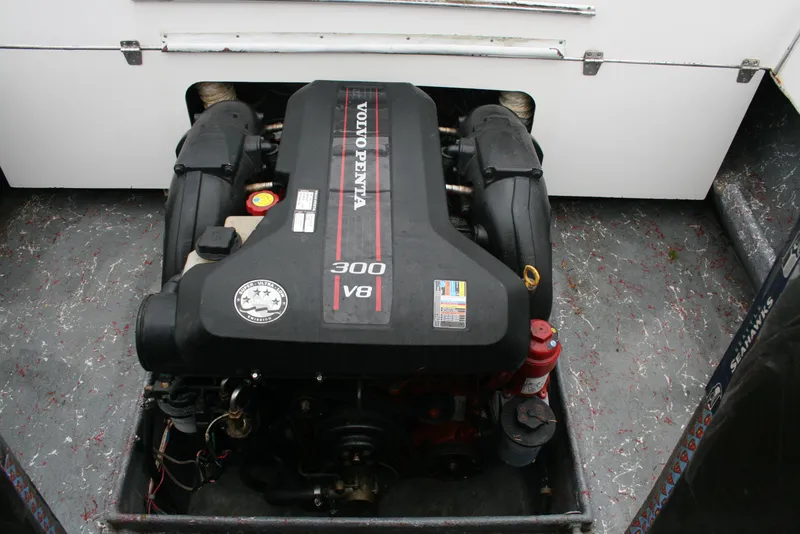 Slide: The Image of 1991 Olympic 23' Runabout boat engine compartment with Volvo Penta V8 300 engine. - 18