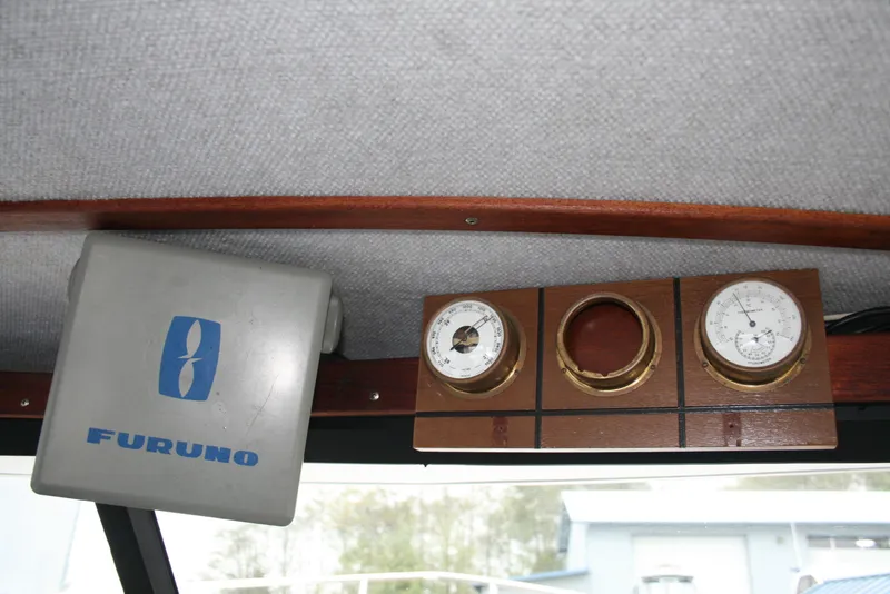 Slide: The Image of Furuno navigation equipment and gauges on a 1991 Olympic 23' Runabout boat. - 5
