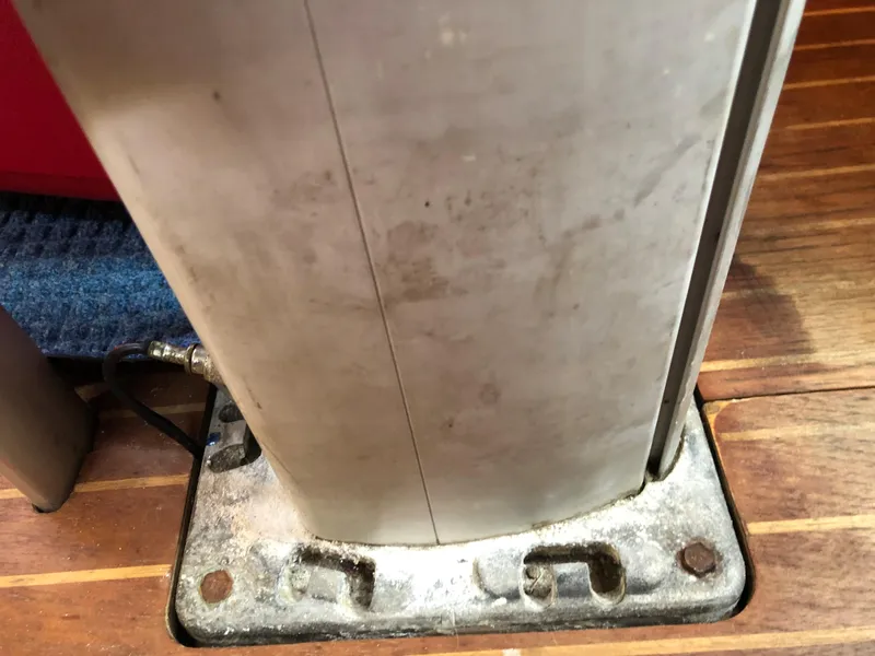 Slide: The Image of Mast base of 1985 Beneteau First 345 sailboat on wooden deck. - 17