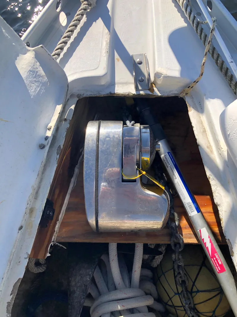 Slide: The Image of Anchor windlass on 1985 Beneteau First 345 sailboat deck. - 18