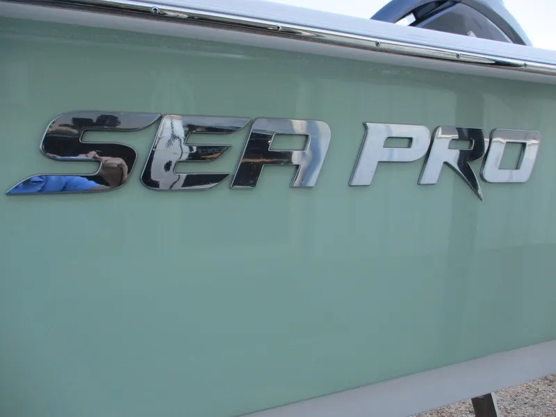 Slide: The Image of 2024 Sea Pro 228 DLX Bay boat logo on side hull - 19