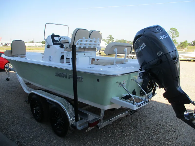 Slide: The Image of 2024 Sea Pro 228 DLX Bay boat with Yamaha 200 engine on trailer. - 3