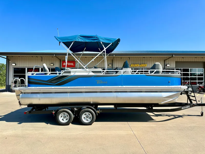 Slide: The Image of 2023 Tahoe Pontoon 23FT Sport 85 Center Console Fish boat on trailer. - 0