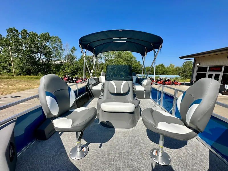 Slide: The Image of 2023 Tahoe Pontoon 23FT Sport 85 Center Console Fish boat with canopy and seating. - 3