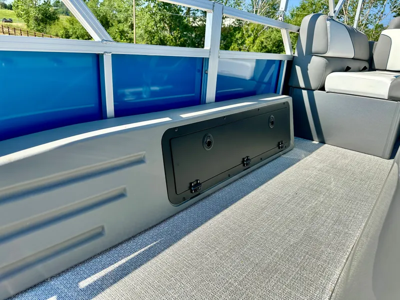 Slide: The Image of 2023 Tahoe Pontoon 23FT Sport 85 Center Console Fish interior with seating and storage. - 5