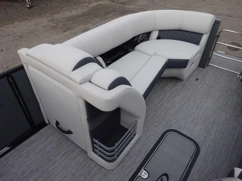 Slide: The Image of 2024 Harris Grand Mariner 230 boat interior with plush seating and modern design. - 10