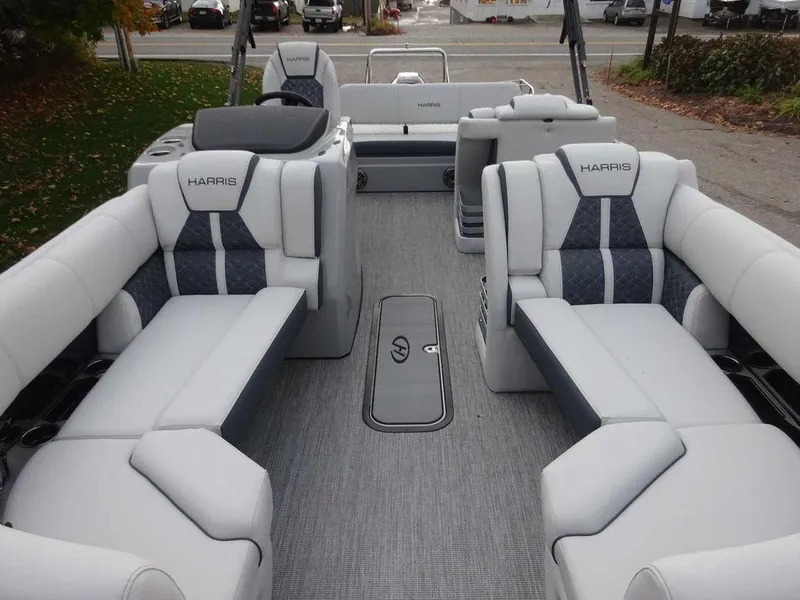 Slide: The Image of 2024 Harris Grand Mariner 230 interior with luxurious seating and modern design. - 8