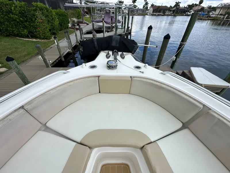 Slide: The Image of 2014 Stamas 317 Tarpon boat bow seating area docked at marina. - 18