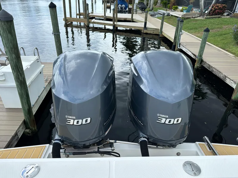 Slide: The Image of 2014 Stamas 317 Tarpon with twin Yamaha 300 outboard engines at dock. - 21