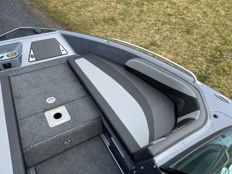 Slide: The Image of 2024 Lund 189 Tyee GL boat interior with gray and black seating. - 14