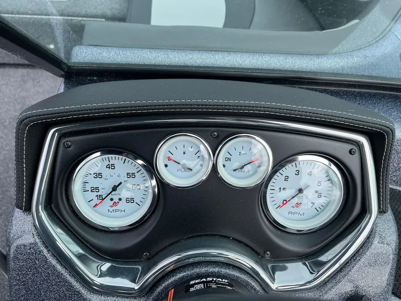 Slide: The Image of Dashboard of 2024 Lund 189 Tyee GL boat with speedometer and RPM gauges. - 27