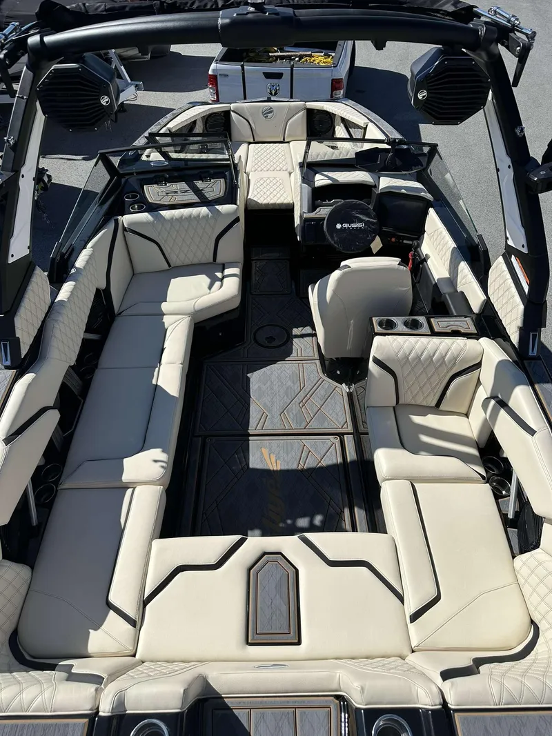 Slide: The Image of 2024 Tigé 24RZX boat interior with luxurious seating and modern design. - 11