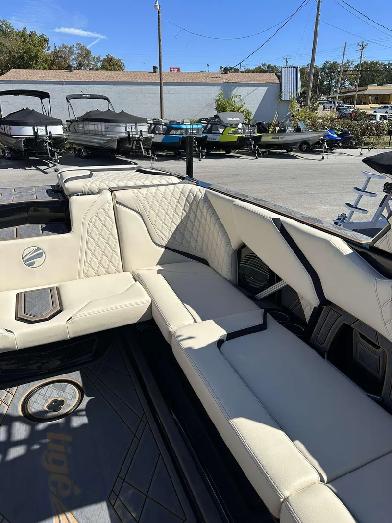 Slide: The Image of 2024 Tigé 24RZX boat interior with luxurious seating and modern design. - 19
