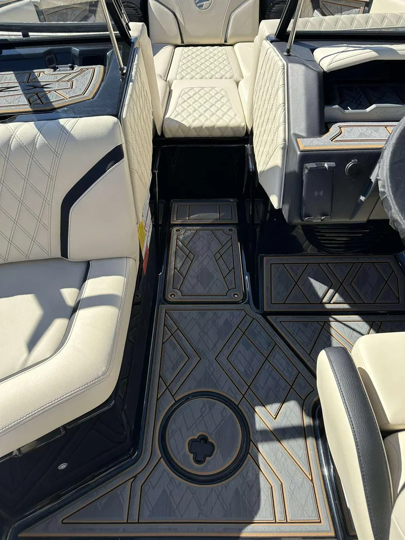 Slide: The Image of 2024 Tigé 24RZX boat interior with luxurious seating and stylish flooring. - 21