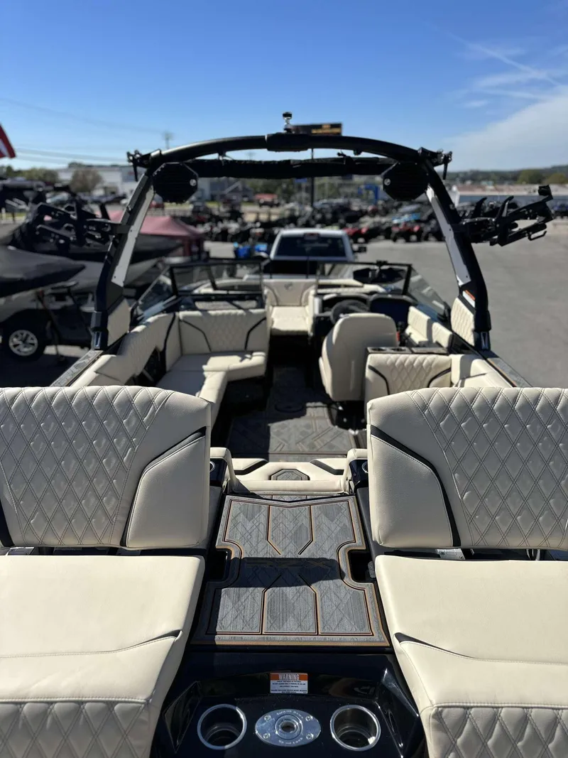 Slide: The Image of 2024 Tigé 24RZX boat interior with luxurious seating and advanced features. - 22