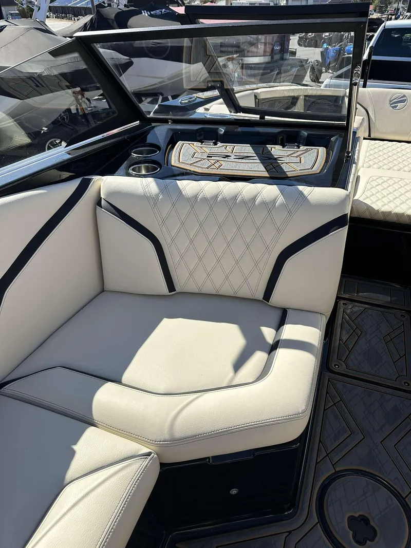 Slide: The Image of 2024 Tigé 24RZX boat interior with luxurious seating and modern design. - 27